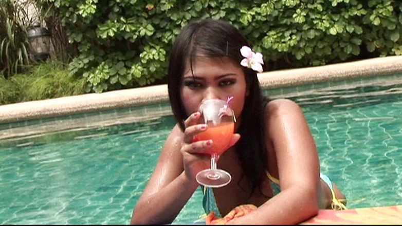 Asian Addiction: By the pool the beautiful Thai Kanda started stroking her...