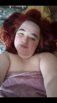 Redhead in the Bed