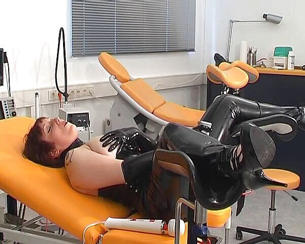 Rubber & Clinic Studio - 1ATOYS: Masturbation in rubber on the gyntable
