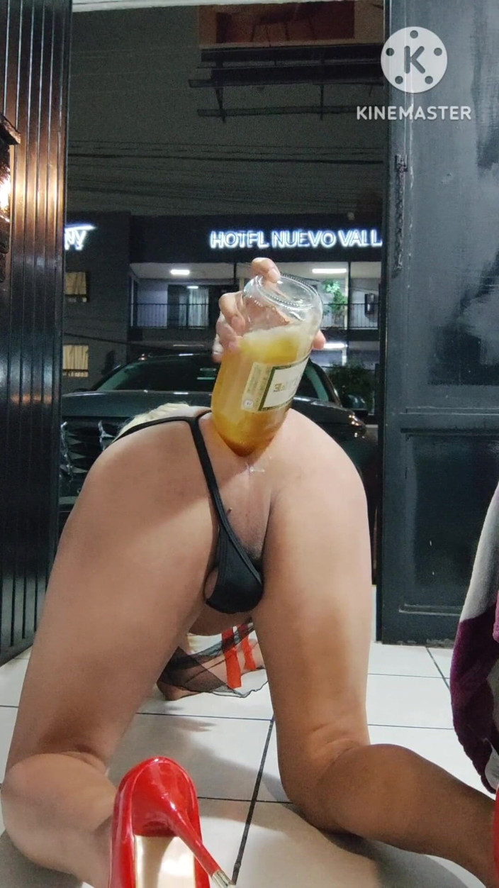 Traviezisha: Sissy in Chastity Trying to Drink a Full Bottle via...