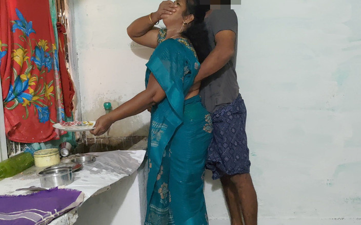 Mathvan: Tia estava limpando os pratos na cozinha usando um saree...