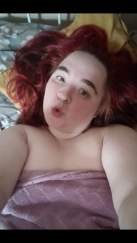 Redhead in the Bed