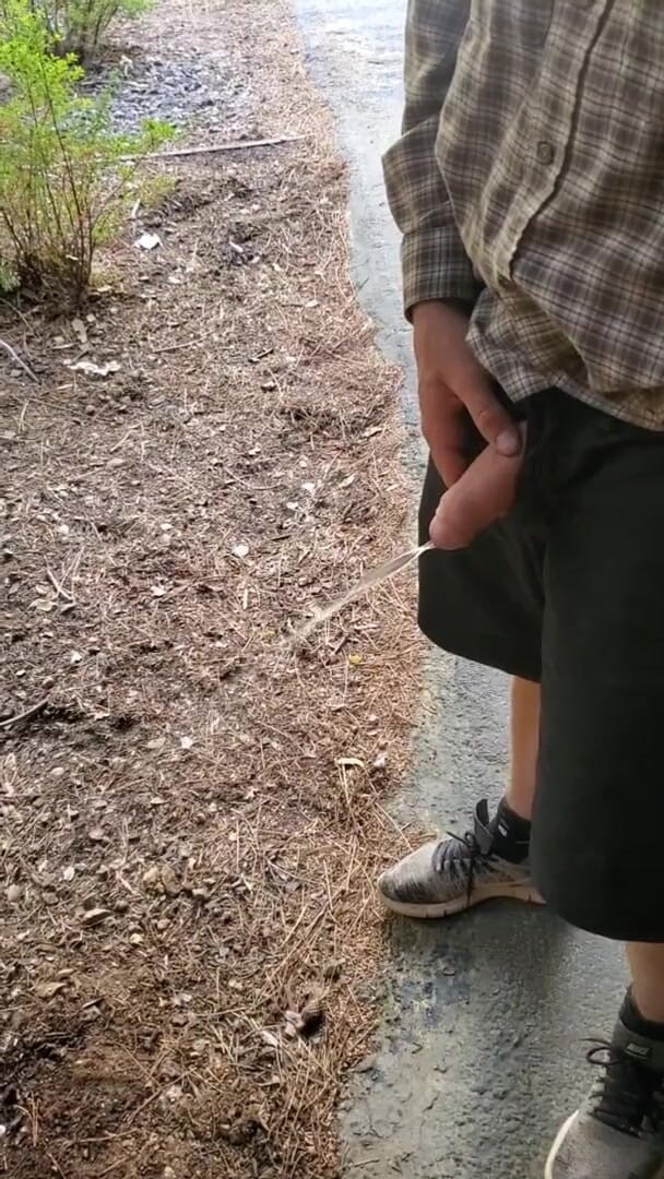 Russie Goodboy: Boy Peeing Outside Cabin