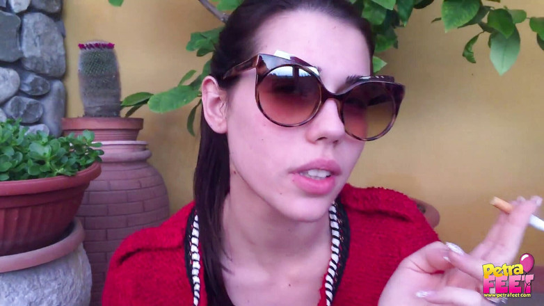 Smokin Fetish: Adorable brunette babe smoking her cigar outdoors