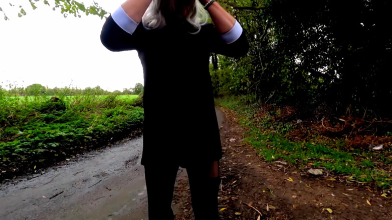 Kellycd2022: Amateur crossdresser Kellycd2022 in black dress and pantyhose outdoors