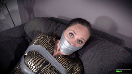 Gag Attack: Leila - catsuit crook in tape bondage